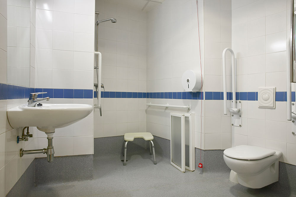 Modern disabled person bathroom wc with sink toilet